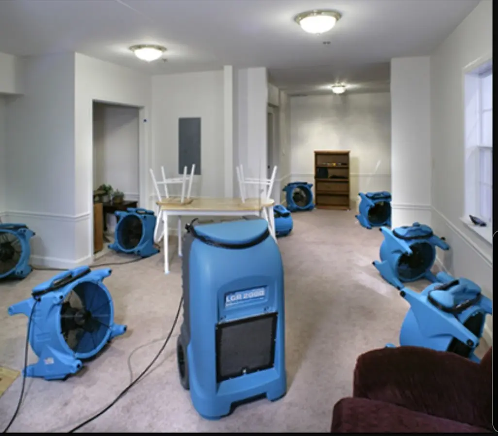 Air movers and dehumidifier setup for Water Damage Restoration in Redding